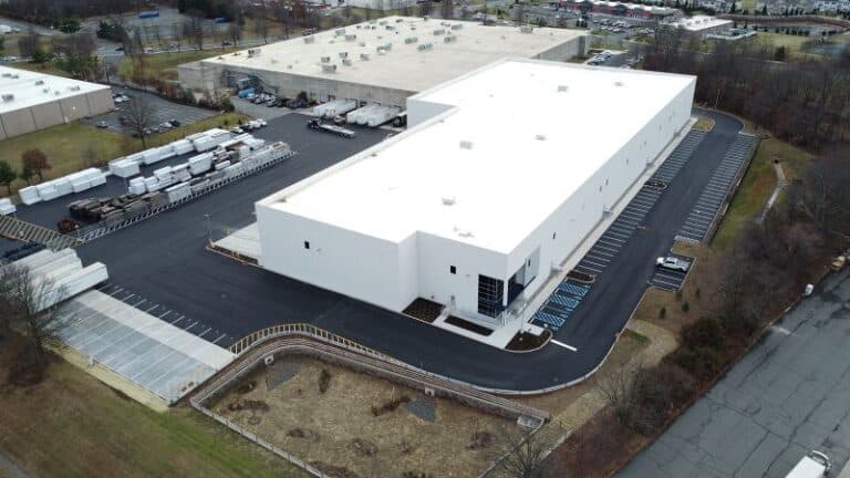 1100 Randolph Road, Somerset NJ. Modern industrial warehouse leased by Ukay Trucking and Farmmi USA, featuring 36-foot clear heights and trailer parking.